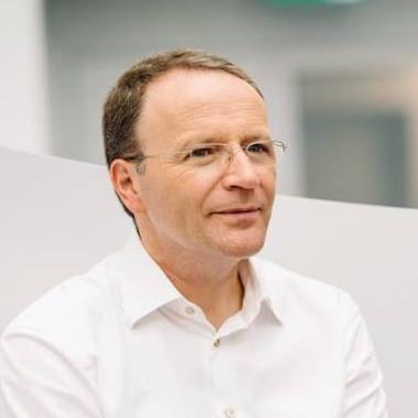 A photo of Mark Schneider